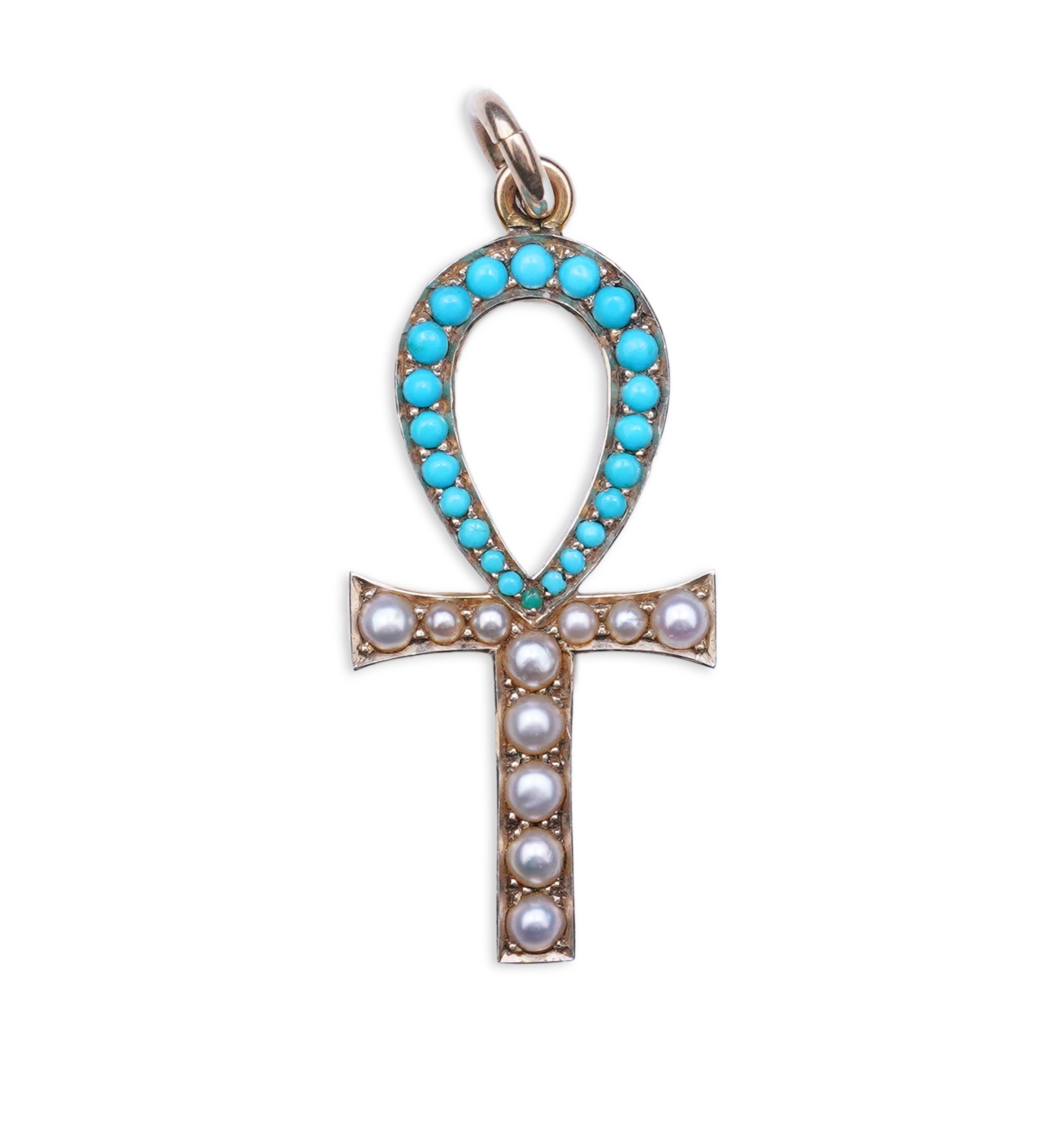 An Edwardian Egyptian revival turquoise and pearl pendant, early 20th century